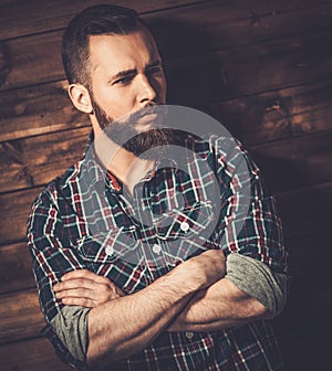 Handsome man wearing checkered shirt