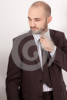 A handsome man wearing a suit