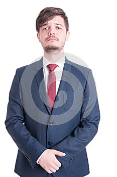 Handsome man wearing suit standing serious