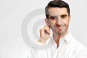 handsome man white shirt posing hand gesture emotions isolated background