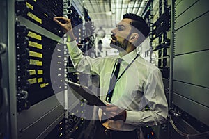 Man in data centre photo