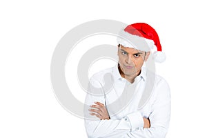 A handsome man in xmas hat showing arrogance and attitude