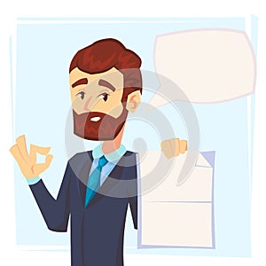 Handsome manager in formal suit holding a blank sheet and ok finger to it with speech bubble. Template for your text. Cartoon char