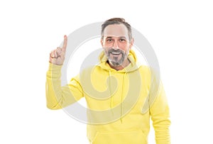 handsome mature man with moustache in hoody pointing finger up isolated on white, announcer.