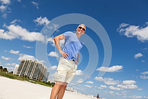 Handsome middle age man at the beach