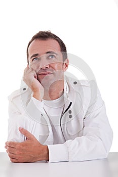 Handsome middle-age man smiling and looking up