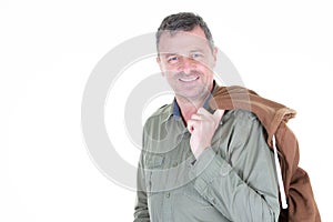 Handsome middle age man in a studio portrait with leather jacket on white wall background