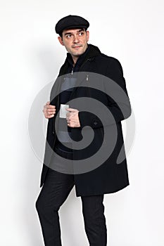 Handsome middle aged man posing in studio on isolated background. Style, elegance, business, gentleman, fashion concept.