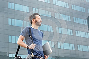 Handsome middle aged man standing outdoors