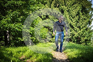 Handsome Muscular Hunk Man Outdoor in City Park