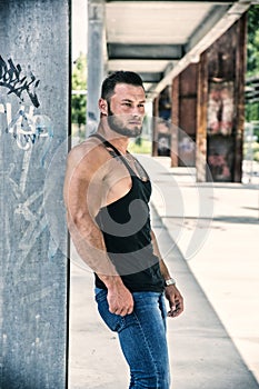 Handsome Muscular Hunk Man Outdoor in City Setting