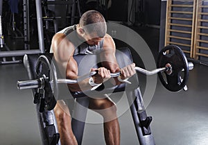 Handsome Muscular Male Model With Perfect Body Doing Biceps Exercise