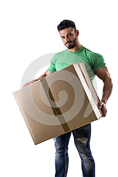 Handsome muscular man holding big cardboard box