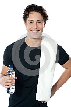 Handsome muscular man with towel