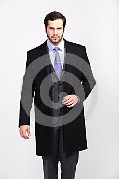 Handsome office business man with beard dressed in elegant suit, photo