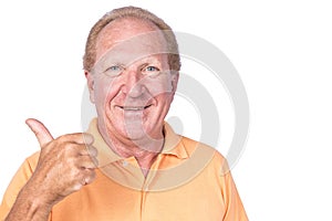 Handsome old man with orange polo-shirt shows thumb up