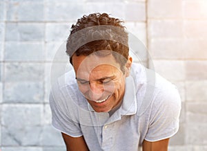 Handsome older man laughing