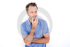 Handsome older man thinking with hand on chin