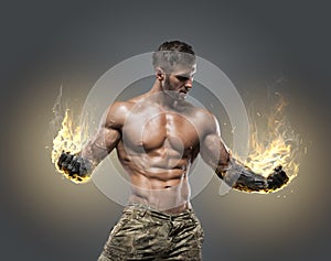 Handsome power athletic man bodybuilder. photo