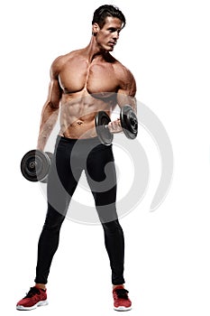 Handsome power athletic man in training pumping up muscles with