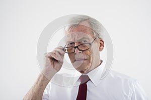 Handsome retired man in glasses photo