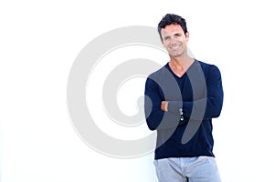 Handsome rugged man smiling against white background photo