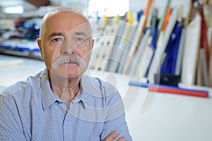 Handsome senior man looking at camera