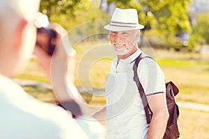 Handsome senior man smiling while posing for photo