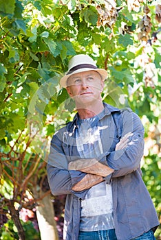 Handsome senior man in straw hat