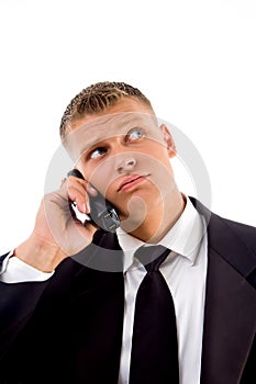 Handsome service provider talking on cell phone
