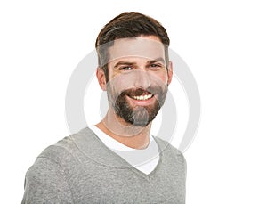 Handsome smiles. Studio shot of a young man smiling at the camera.