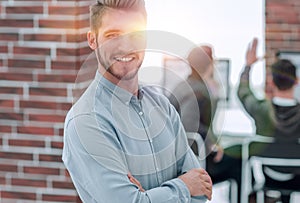 Handsome smiling confident businessman portrait.