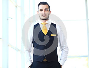 Handsome smiling confident businessman