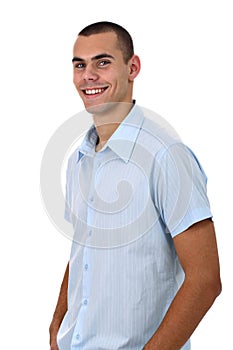 Handsome smiling young man in blue shirt isolated