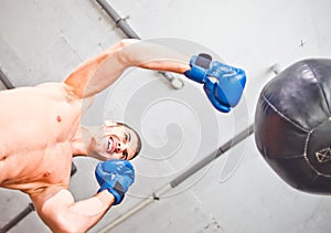 Handsome smilling sports man boxer