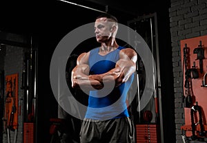 Handsome strong athletic man pumping up muscles, training, bodybuilding concept, muscular bodybuilder, handsome men doing