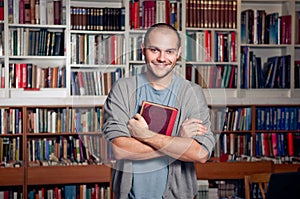 Handsome student in library