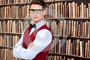 Handsome student in library