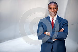 Handsome successful cheerful african american executive business man in modern stylish suit, CEO, copy space photo