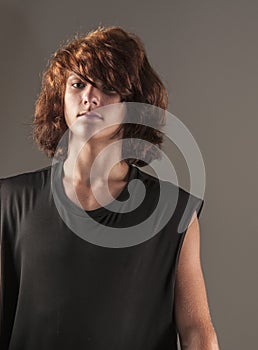 Handsome teenage boy with dyed, punk hair, off center shot