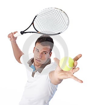 Handsome tennis player serving