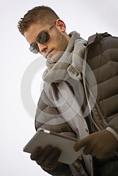 Handsome trendy man in winter fashion