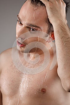 Handsome and wet young man