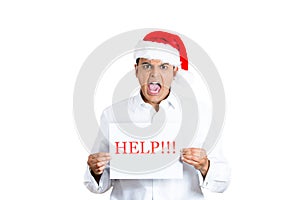 A handsome xmas man yelling out for help