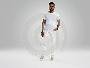 Handsome young african american guy posing in studio - isolated