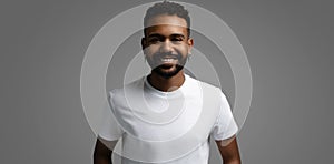 Handsome young african american guy posing in studio - isolated