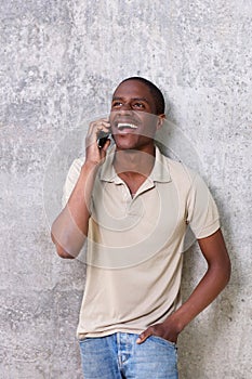 Handsome young african american man talking on mobile