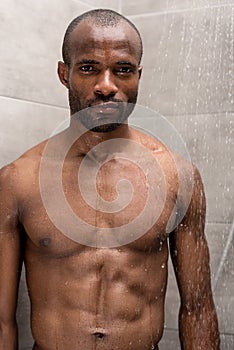 handsome young bare-chested african american man