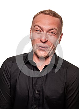 Handsome young blond man in a black shirt, isolated on a white background