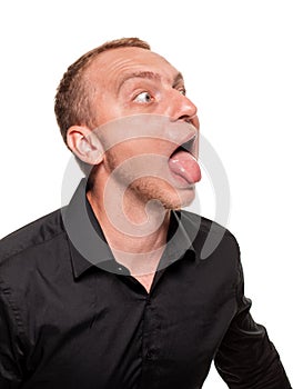 Handsome young blond man in a black shirt, isolated on a white background